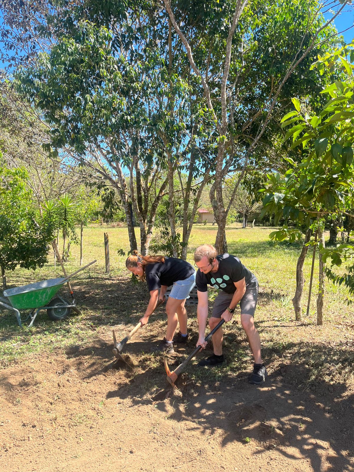 Noah and Viviana with harvest